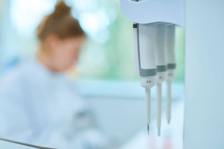 Woman in a lab blurred